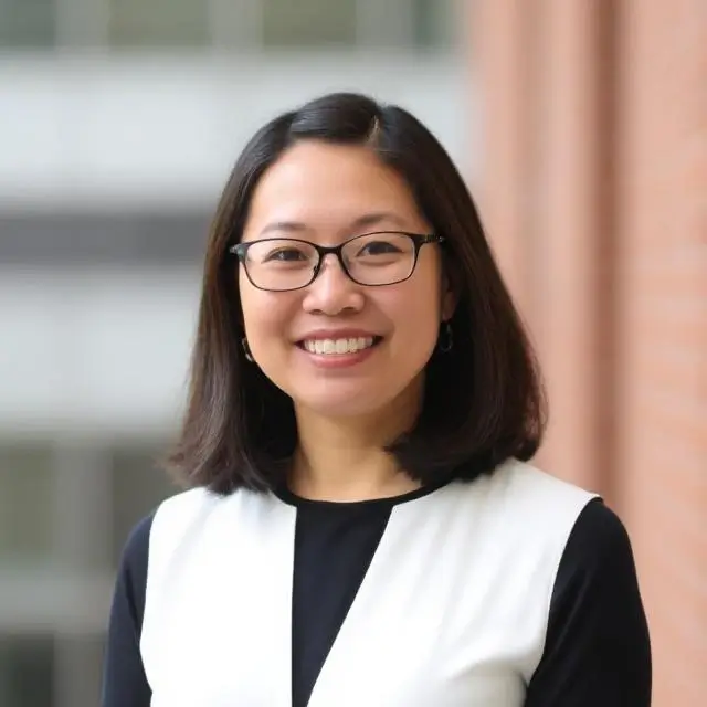 Portrait of Maria Chen, Director of Admissions