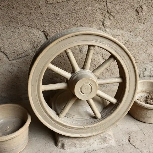 A pottery wheel with clay.