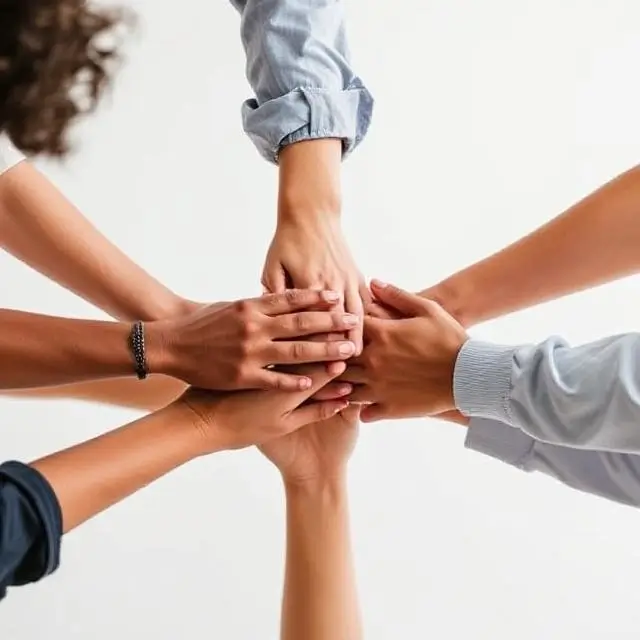 Diverse group of hands together